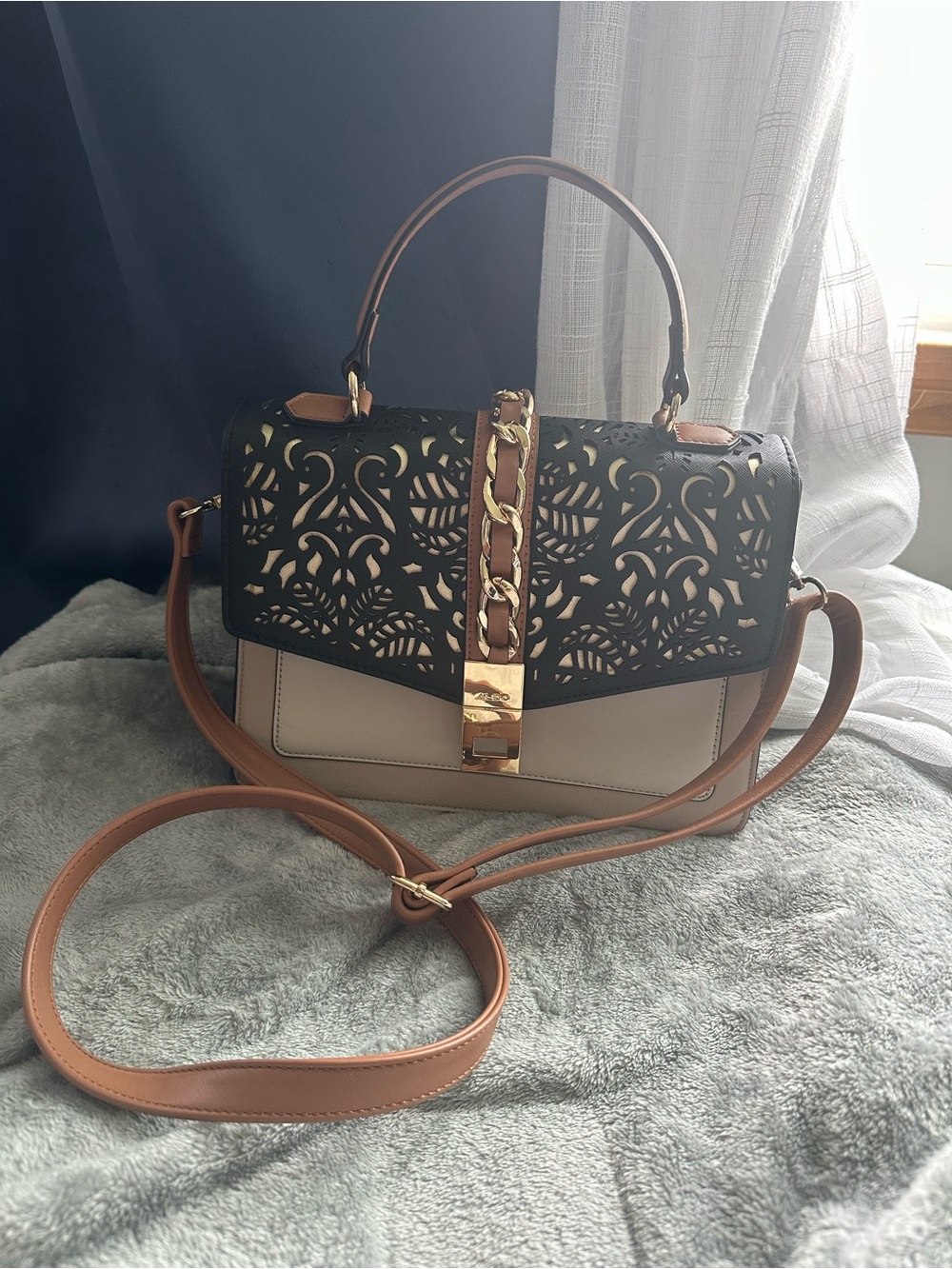 Aldo Black Laser-Cut Flap Crossbody with Cream Body and Tan Trim